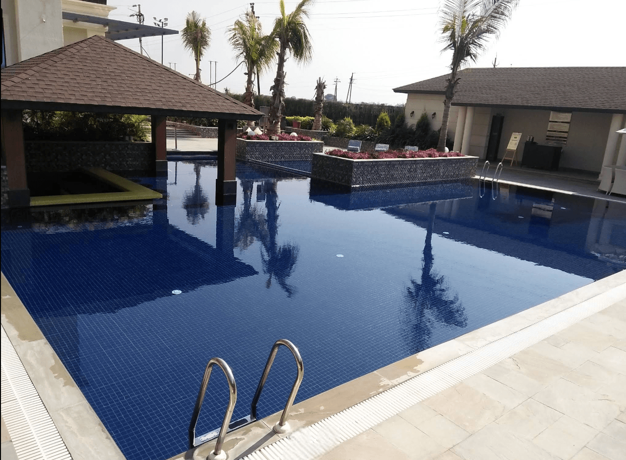 Swimming Pool & Landscape Development Mid India Creation (Hotel TGB) Project – Indore - main swimming pool tgb 111 photoroom